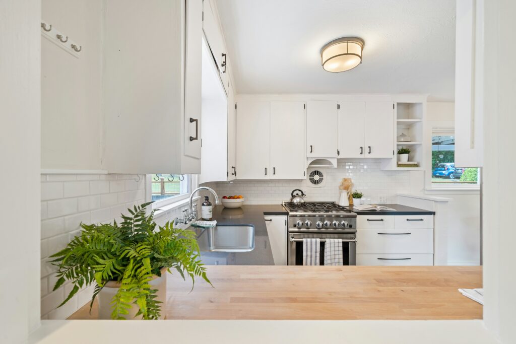 Ceiling-Mounted Fixtures in a modern kitchen decor with Light colors 