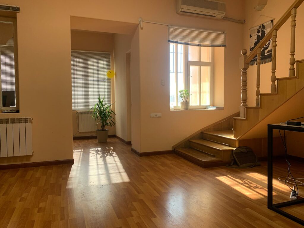 Picture of house empty of furniture with hardwood flooring