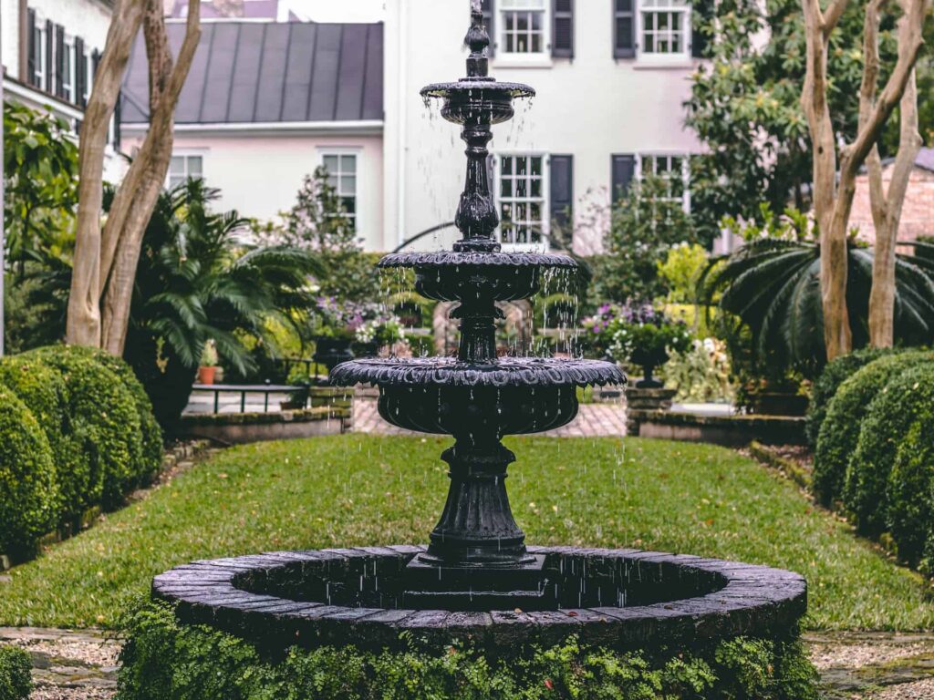 fountain in beautiful green garden