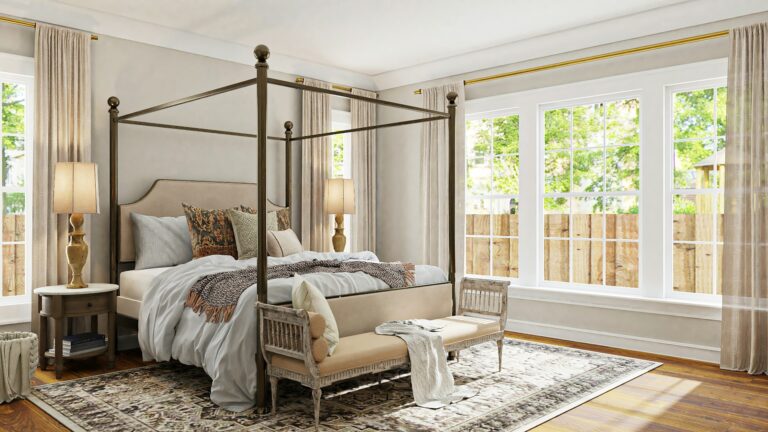 A stylish bedroom featuring a canopy bed and an elegant rug, creating a serene and inviting atmosphere.